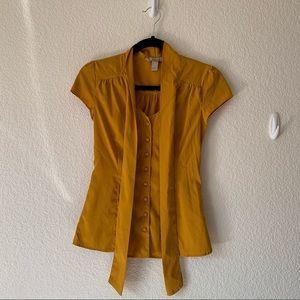 Mustard yellow front bow tie cap sleeve blouse